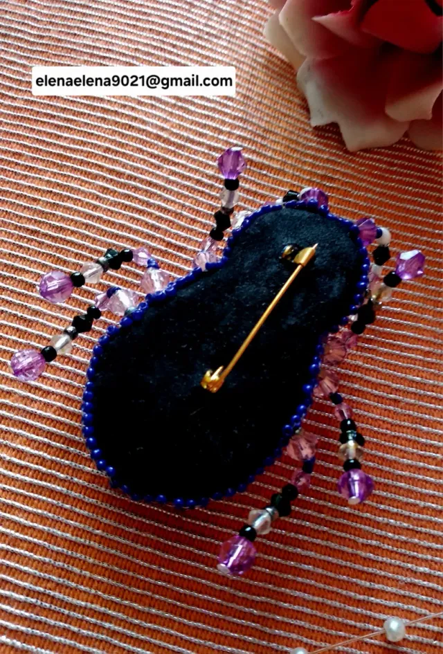 Broche bicho de noche