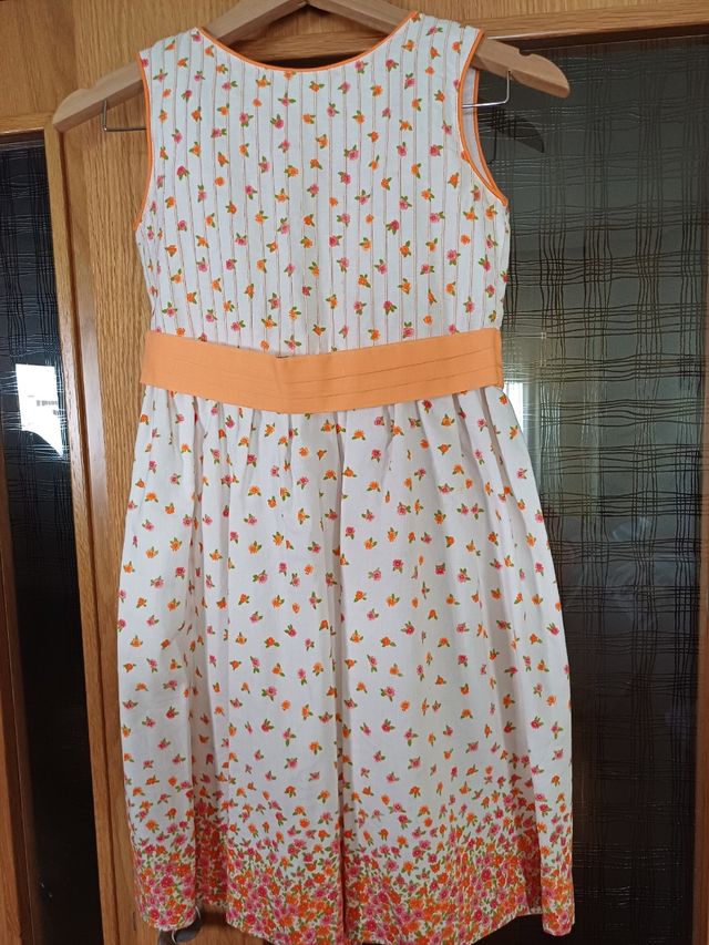 Vestido niña flores naranjas