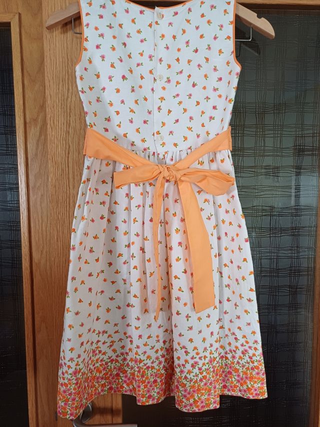 Vestido niña flores naranjas