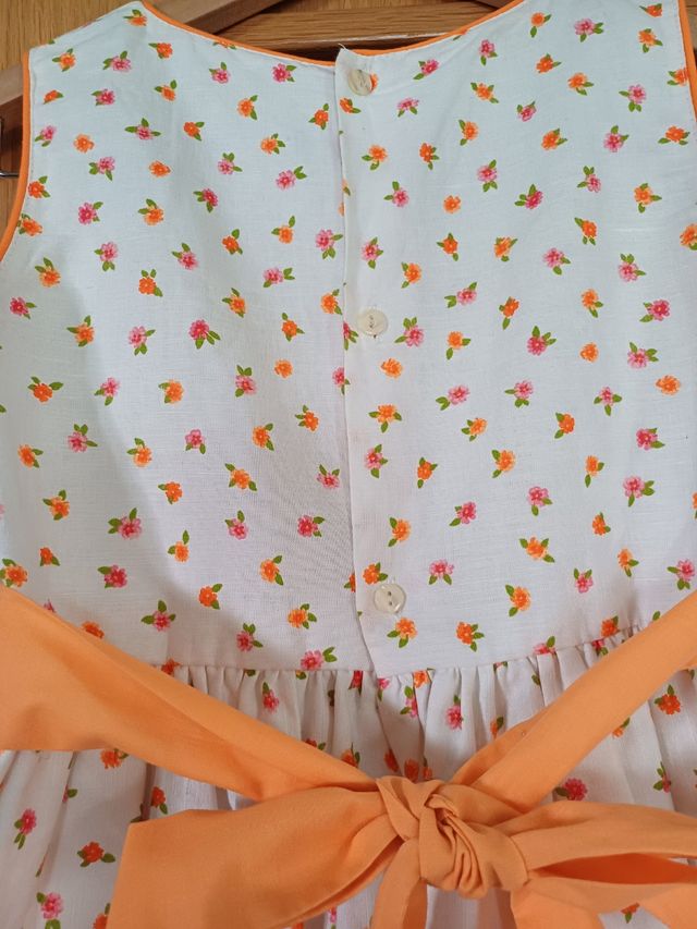 Vestido niña flores naranjas