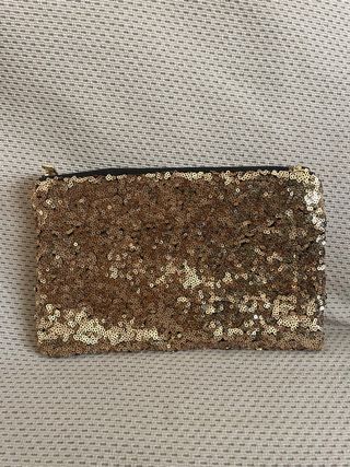 Cartera de mano dorada