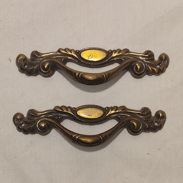 #144 Tiradores pomos metal acabado bronce