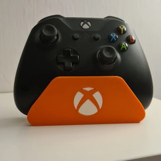 Soporte para mandos de Xbox con logo