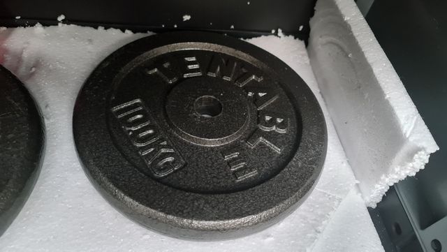 Barra con 2 discos de 10kg cada uno