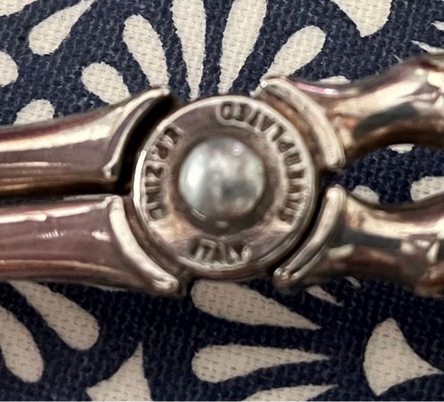 Mestolo e pinza per alimenti