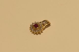 COLGANTE DE ORO 18K/1.8Gr