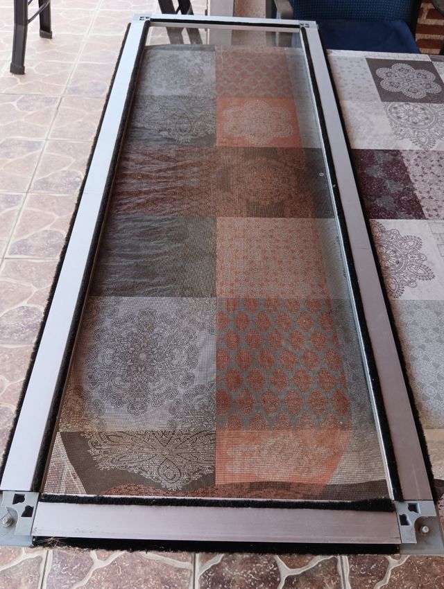 Mosquitera de aluminio.