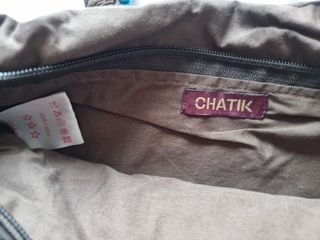 Bolso y cinturón marrón y azul turquesa de Carioca
