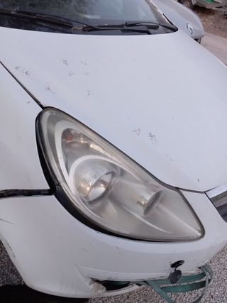 Opel Corsa 1.3 faro retrovisor piloto botón malete