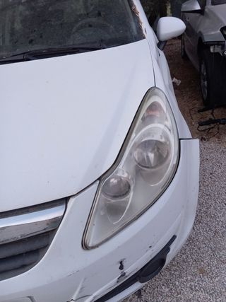 Opel Corsa 1.3 faro retrovisor piloto botón malete