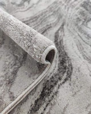 Carpete de base rígida