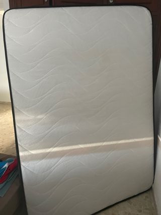 Colchon practicamente nuevo .