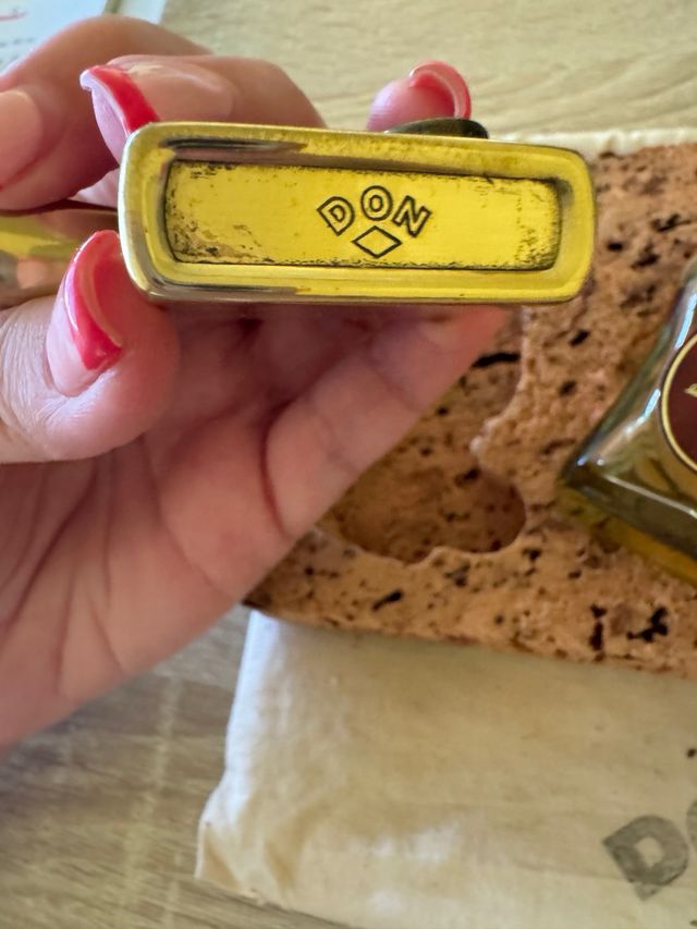 Conjunto mechero y botellita Don