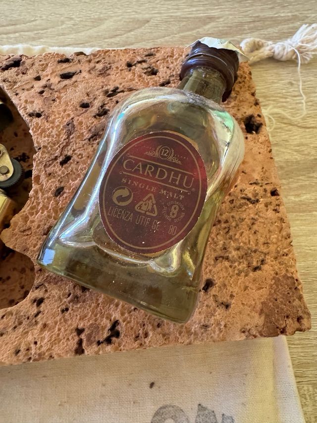 Conjunto mechero y botellita Don