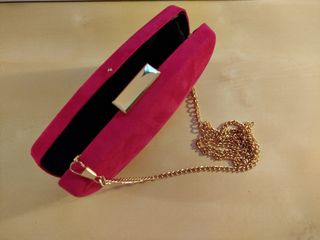 Bolso de fiesta rosa fúcsia .