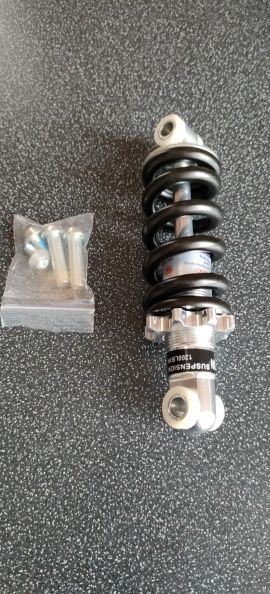 Suspensión de bicicleta y patinete