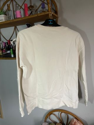 Sudadera blanca con flecos