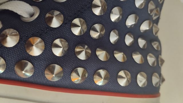 Sneakers alte con borchie Prima Donna