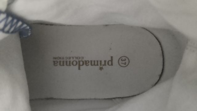 Sneakers alte con borchie Prima Donna