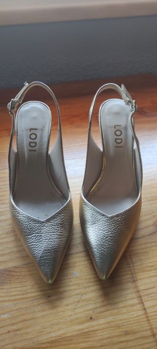 Zapatos lodi dorados