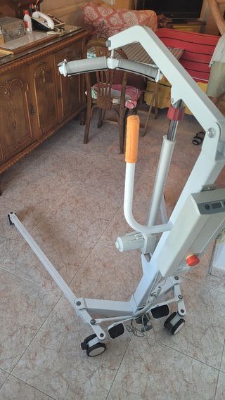 Grua transferencia con arnés