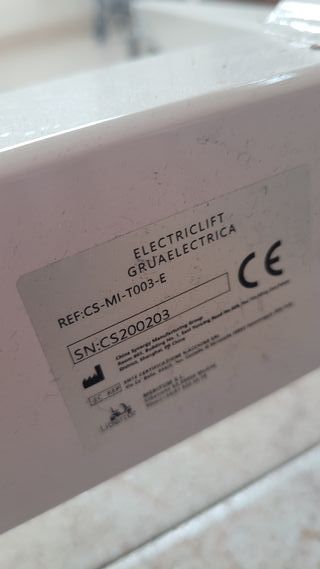 Grua transferencia con arnés