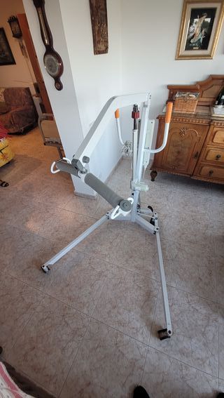 Grua transferencia con arnés