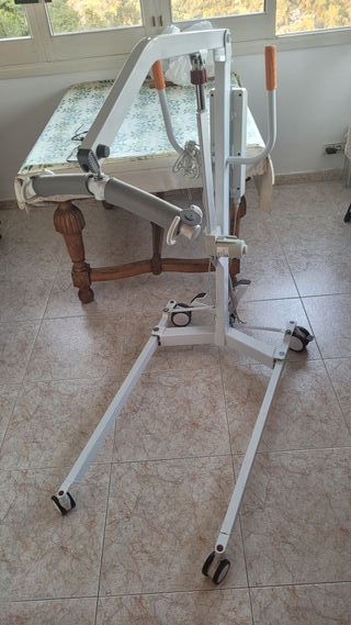 Grua transferencia con arnés