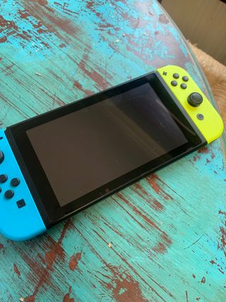 Nintendo Switch + mando pro y funda