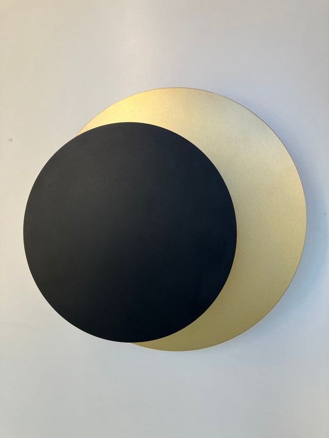Lampada parete oro/nero Led effetto "eclisse"