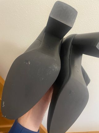 Botas altas de piel mosqueteras