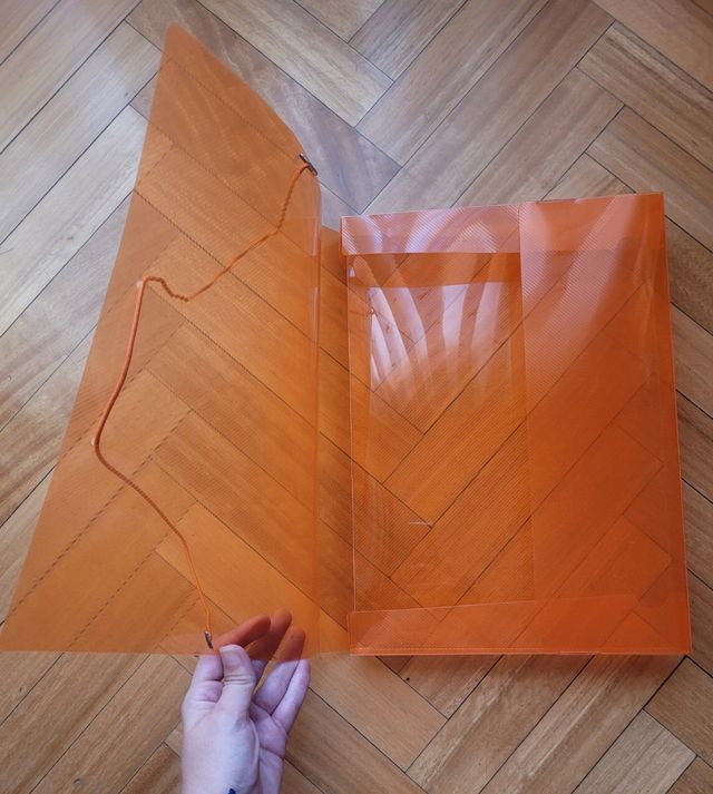 Carpeta transparente naranja