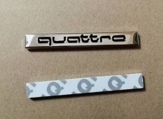 Emblema insignia audi quattro cromado