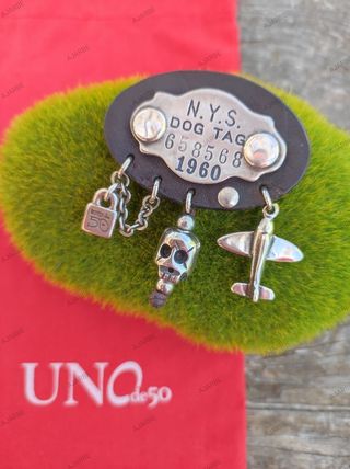 Broche Uno de 50