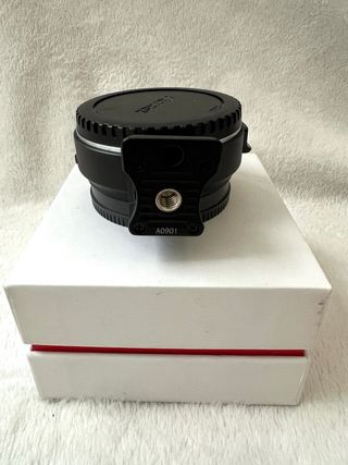 Adaptador cámara de fotos tipo E.