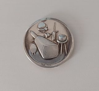 Moneta pubblicitaria in argento