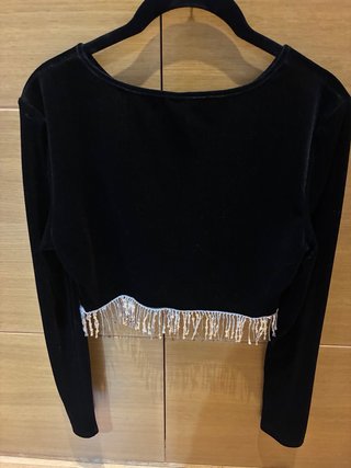 Conjunto top de manga larga y minifalda