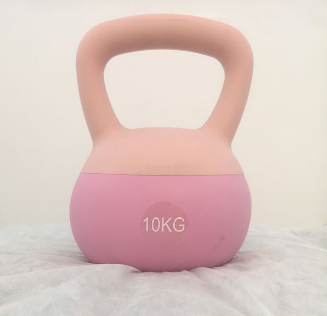 Kettlebell 10kg PVC. Blanda, verde o rosa.