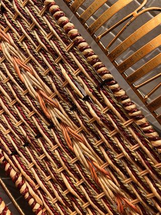 Portariviste in ferro battuto e vimini