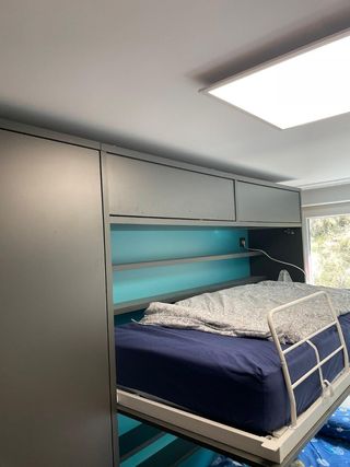 Habitación infantil con litera abatible