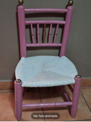 Silla baja de costurera.
