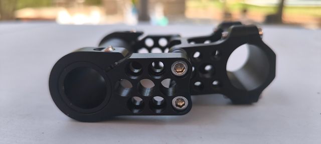 Extensor elevador manillar