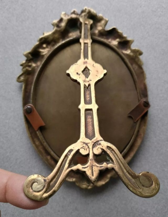 Coppia antiche cornici ovali in bronzo