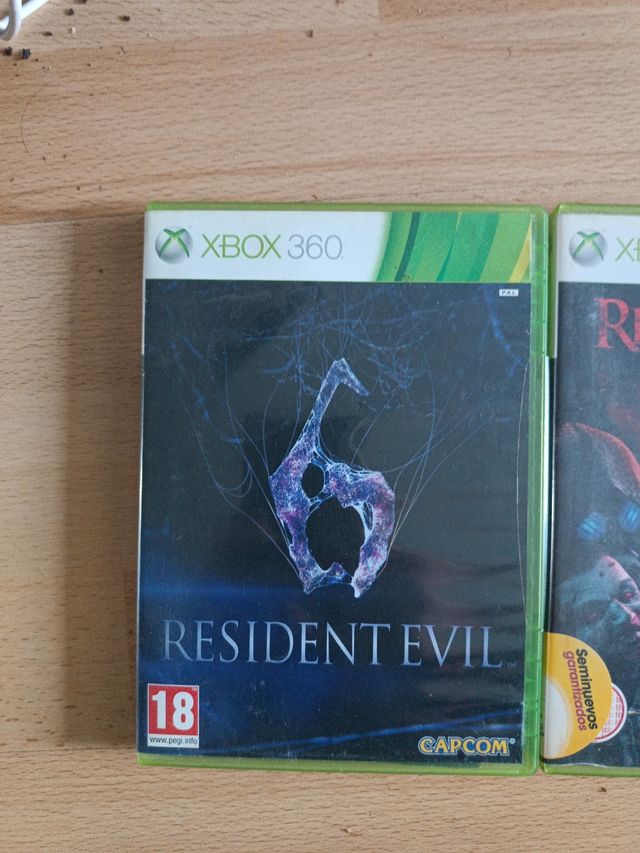 Juegos Xbox resident evil 6 y op Racoon