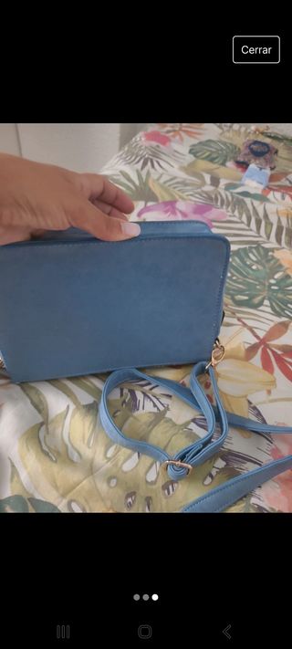 Bolso serpiente con metal