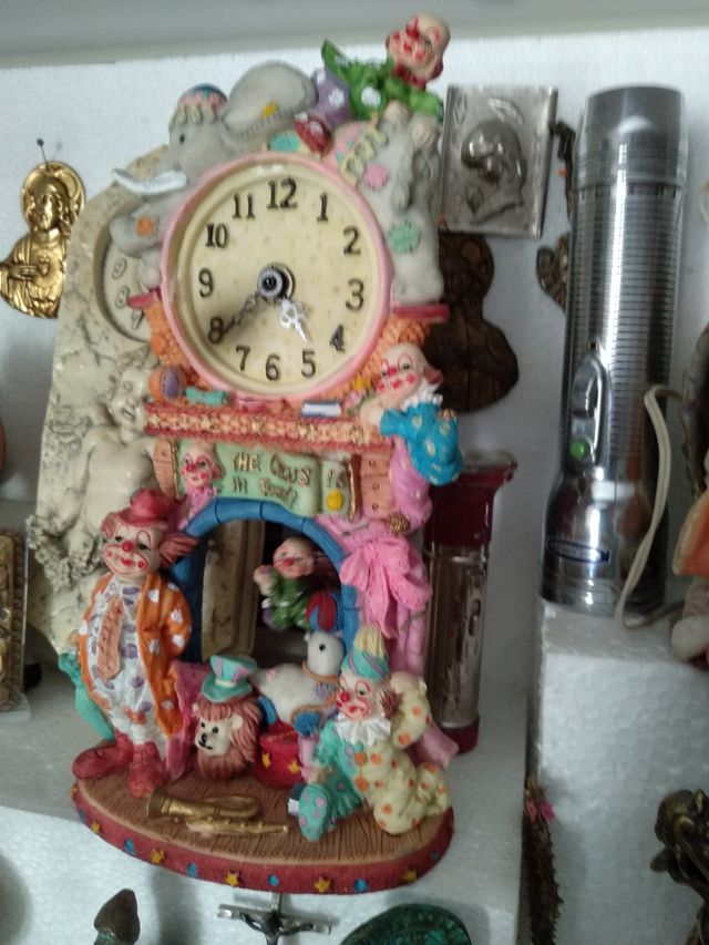 antiguo reloj feria de payasos clown