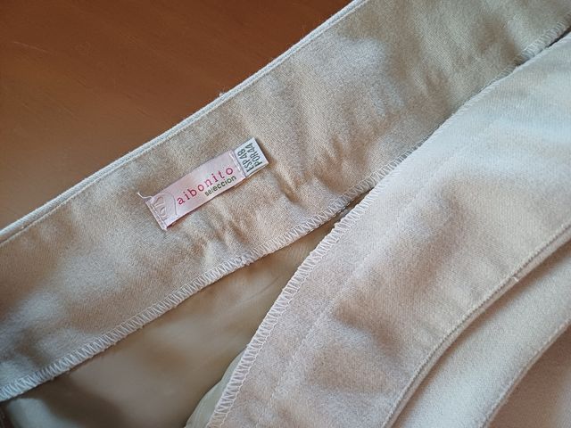 Traje falda y chaqueta.