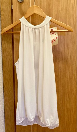 Blusa blanca sin mangas de cuello Halter