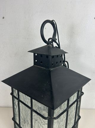 Antiguo farol de hierro forjado