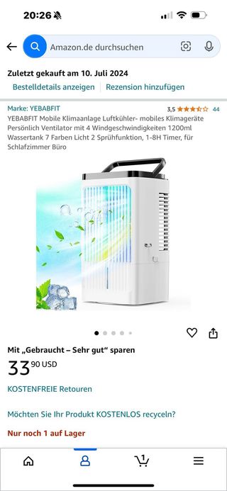 Ventilador sobre mesa y humidificador frio